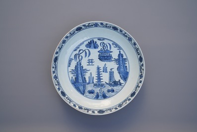 A large Chinese blue and white dish with a landscape with pagoda, Jiajing