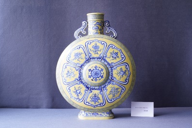 A Chinese yellow-ground blue and white 'Bajixiang' moon flask vase, Yongzheng mark, 19/20th C.
