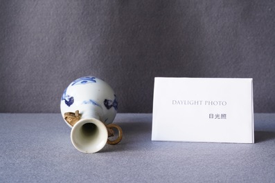 A Chinese blue and white vase with gilt elephant-head handles, Kangxi