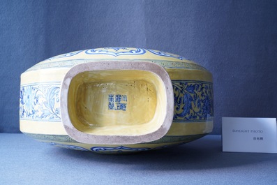 A Chinese yellow-ground blue and white 'Bajixiang' moon flask vase, Yongzheng mark, 19/20th C.