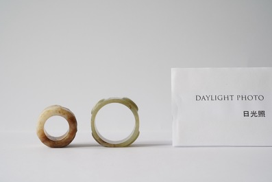 Two Chinese jade archer's rings, 18/19th C.