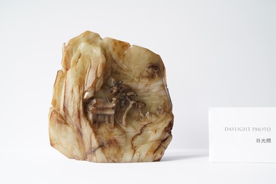 A Chinese mottled white jade mountain landscape with a fishing boat, Qing