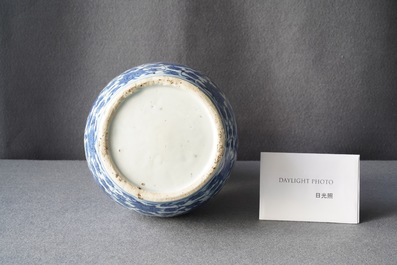 A Chinese blue and white 'lotus scroll' double gourd vase, Wanli