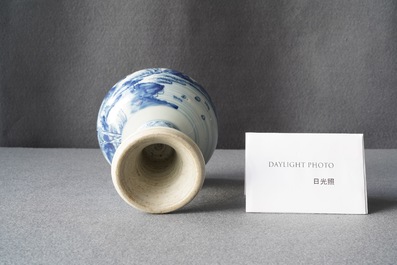 A Chinese blue and white stem cup with a continuous landscape scene, Kangxi/Yongzheng