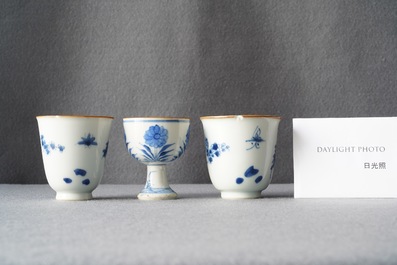 Two Chinese blue and white wine cups and a stem cup, Transitional period