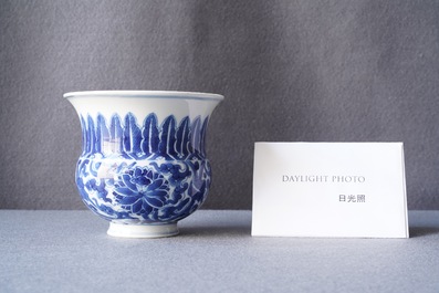 A Chinese blue and white 'lotus scroll' spittoon or zhadou, Kangxi