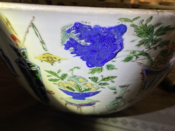 A large Chinese famille verte 'antiquities' bowl, Kangxi