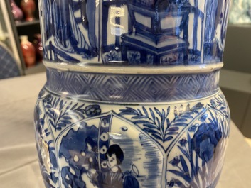 A pair of large Chinese blue and white 'Long Eliza' beaker vases, Kangxi
