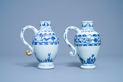 A pair of Chinese blue and white ewers, Transitional period