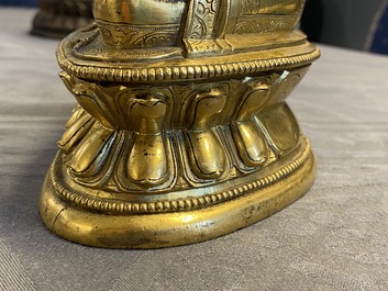 A Chinese gilt bronze figure of Buddha, 17th C.