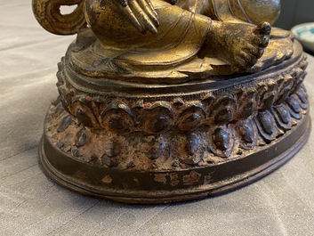 A Nepalese gilt bronze figure of White Tara, 16th C.