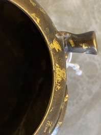 A Chinese gold-splashed bronze peach-form censer, Xuande mark, 18th C.