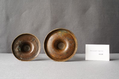 Two Flemish or Dutch knotted bronze candlesticks, 16th C.