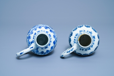 A pair of Chinese blue and white ewers, Transitional period