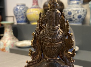 A Nepalese gilt bronze figure of White Tara, 16th C.