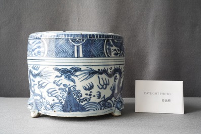 A Chinese blue and white 'dragon' tripod censer, Ming