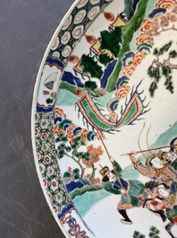 A Chinese famille verte dish with warriors on horseback, Kangxi