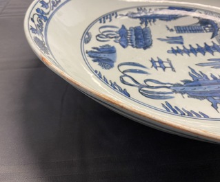 A large Chinese blue and white dish with a landscape with pagoda, Jiajing