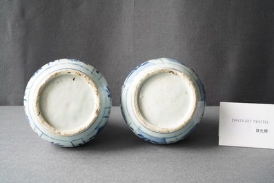 A pair of Chinese blue and white 'garlic head' bottle vases, Wanli