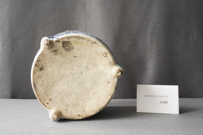 A Chinese blue and white 'dragon' tripod censer, Ming