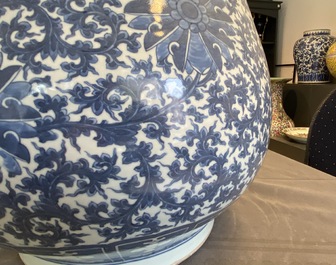 A Chinese blue and white 'hu' vase with lotus scrolls, 19th C.