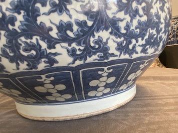 A Chinese blue and white 'hu' vase with lotus scrolls, 19th C.