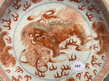 A Chinese blue, white and iron red 'Buddhist lion' dish, Qianlong mark, 19th C.