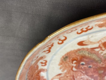 A Chinese blue, white and iron red 'Buddhist lion' dish, Qianlong mark, 19th C.