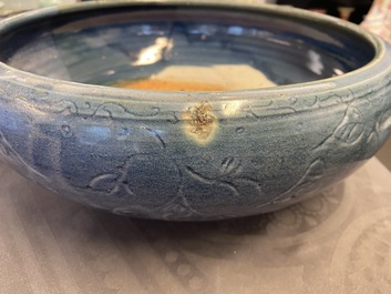 A Chinese monochrome blue censer with incised floral design, Ming