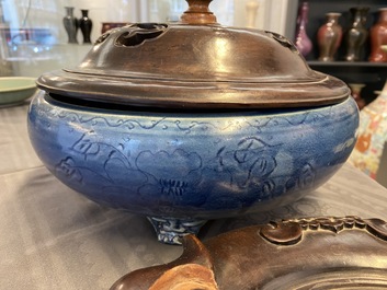A Chinese monochrome blue censer with incised floral design, Ming