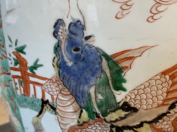 A large Chinese famille verte 'mythical beasts' jar with wooden cover, Kangxi
