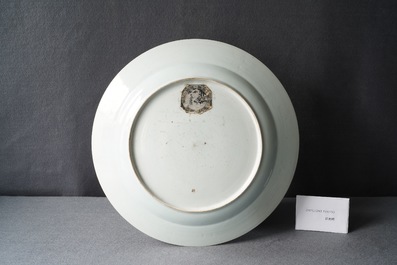 A large Chinese famille verte dish with ladies and boys in a garden, Kangxi