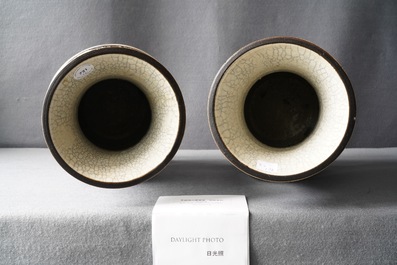A pair of Chinese Nanking famille rose crackle-glazed 'warrior' vases, 19th C.
