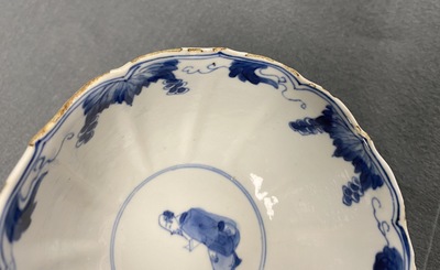 A pair of Chinese blue and white 'Long Eliza' bowls, Chenghua mark, Kangxi