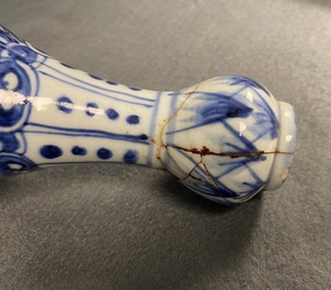 A pair of Chinese blue and white 'garlic head' bottle vases, Wanli