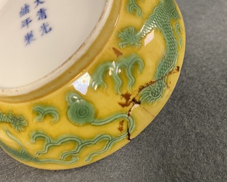 Three Chinese yellow-ground saucer dishes, 19/20th C.