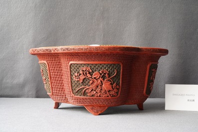 A Chinese quatrefoil jardini&egrave;re in red and black lacquer, Qianlong