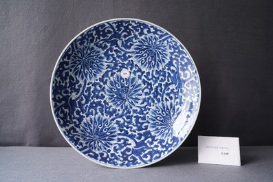 A Chinese blue and white 'lotus scroll' charger, Kangxi