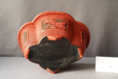 A Chinese quatrefoil jardini&egrave;re in red and black lacquer, Qianlong