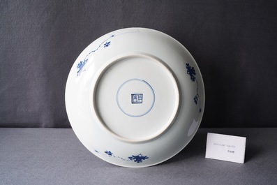 A Chinese blue and white 'lotus scroll' charger, Kangxi