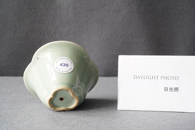 A Chinese blue, white and celadon-glazed 'Lu Hong Jian' puzzle or trick cup, Qianlong