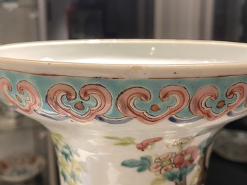 A pair of Chinese famille rose vases with birds among blossoming branches, 19th C.