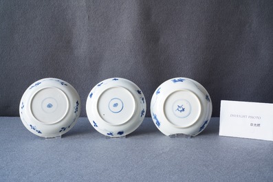 Seven Chinese blue and white cups and saucers, Kangxi