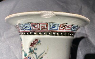 A Chinese famille rose vase with figures and antiquities, 19th C.