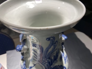 Two Chinese blue and white celadon 'dragon and phoenix' vases, 19th C.