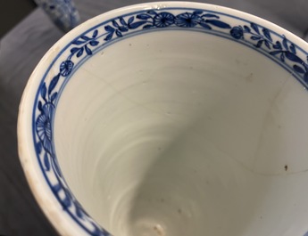 Two Chinese blue and white beaker vases and a bottle vase, Kangxi/Qianlong
