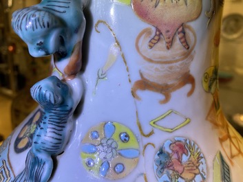 A pair of Chinese Canton famille rose vases and two single vases, 19th C.