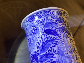 Two Chinese blue and white beaker vases and a bottle vase, Kangxi/Qianlong