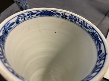 Two Chinese blue and white beaker vases and a bottle vase, Kangxi/Qianlong
