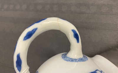 A Chinese blue and white 'landscape' teapot and cover, Kangxi